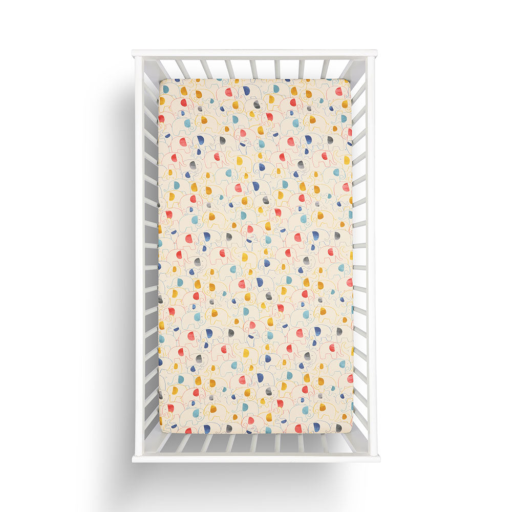 Organic Cotton Fitted Sheet, Cot Size, Elephant Print, Multi Colour, Creams, Reds, Blues, Yellows and oranges